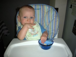 self-feeder feeding himself