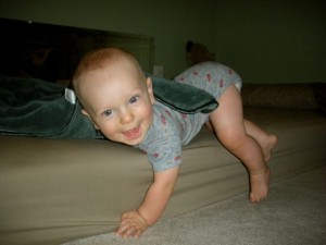 tan-legs2 climbing off his bed